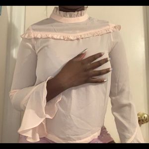 Soft pink ruffled blouse